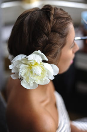 Bride with flower in her hair - Hair and Makeup by Claire Salter