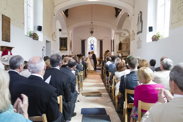 Bride and groom kiss