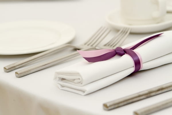 Napkin with purple ribbon