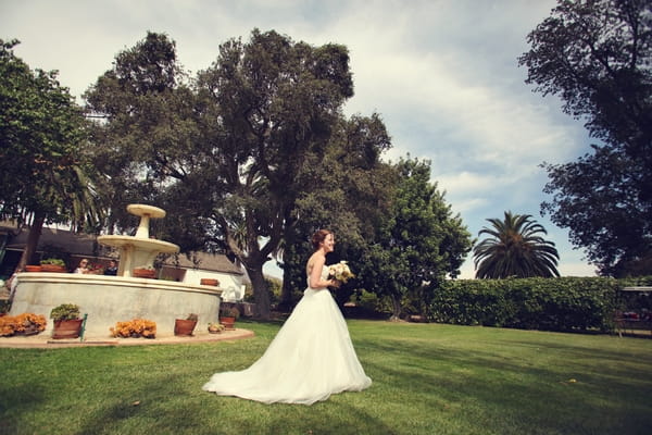 Bride walking to wedding ceremony