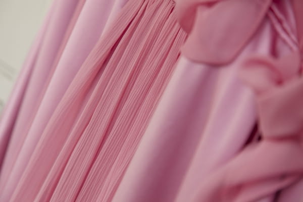 Close up of pink bridesmaid dresses