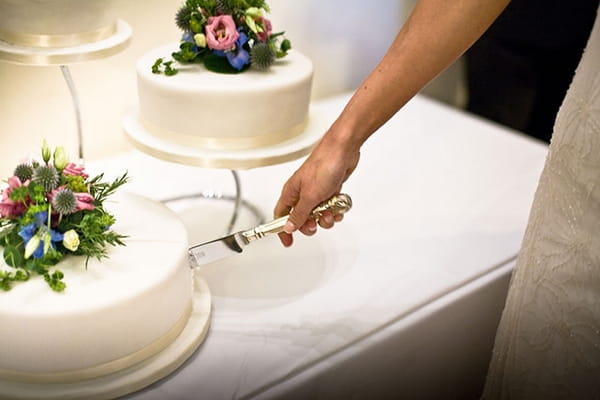 Cutting wedding cake