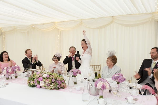 Bride punching the air