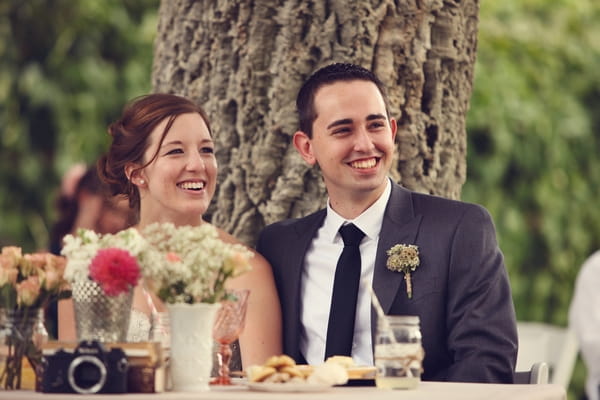 Bride and groom smiling