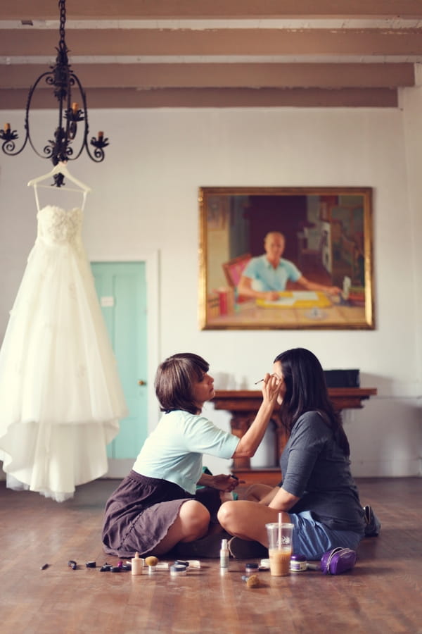 Bridesmaids doing make-up