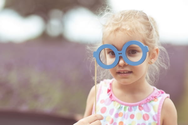 Child Posing with Glasses
