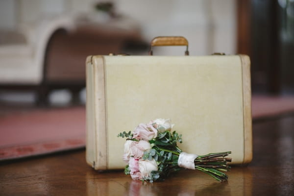 Suitcase and bouquet