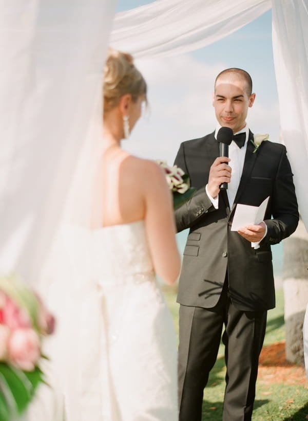 Groom saying wedding vows