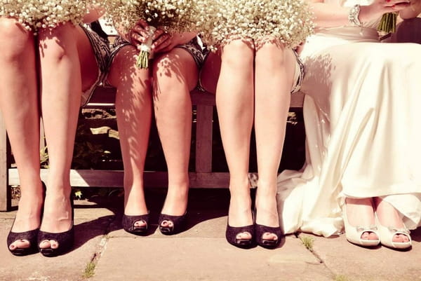 Bride and bridesmaids' legs