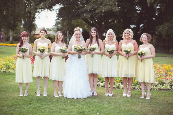 Bride with bridesmaids in yellow dresses