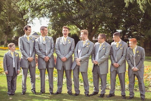 Groomsmen pulling faces