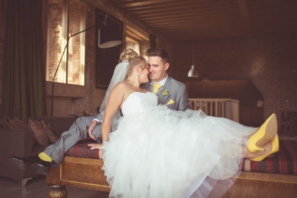 Bride and groom sitting down