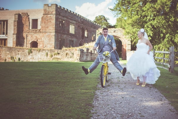 Groom riding bike at Astley Castle