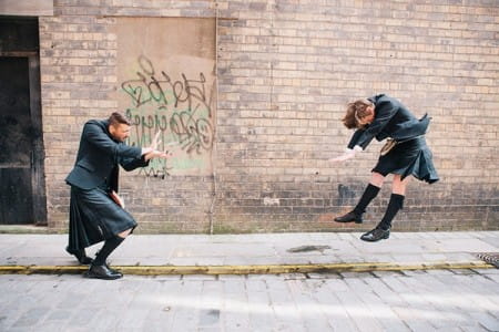 Groomsmen pretending to do Street Fighter moves - Picture by Mirrorbox Photography