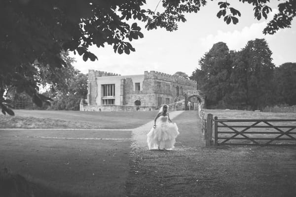 Bride in grounds of Astley Castle