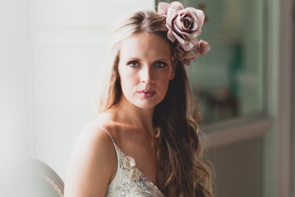 Bride with large flower in hair