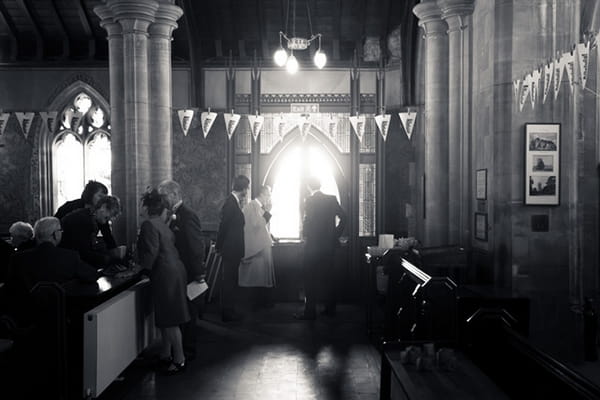 People in church before wedding ceremony