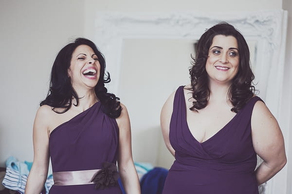 Bridesmaids in purple dresses