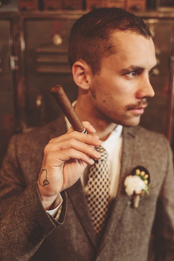 Man holding cigar