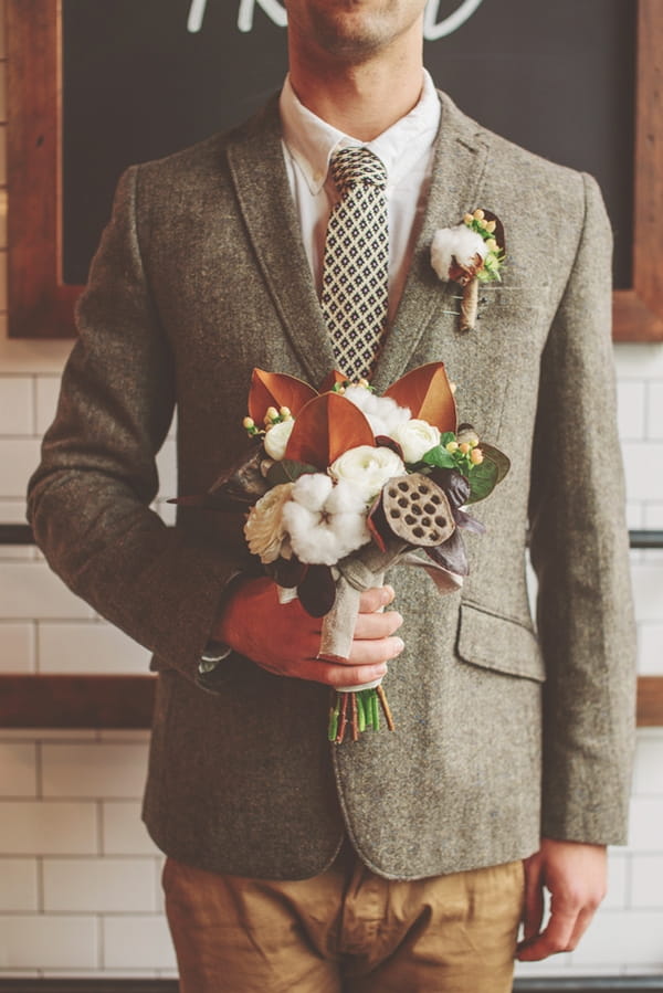 Man holding bouquet