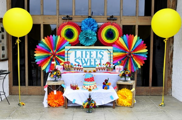 Colourful carnival style wedding sweet table