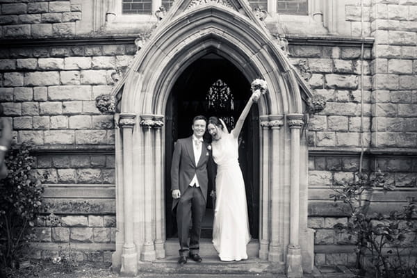 Bride and groom leaving church