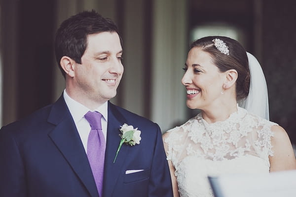 Bride and groom looking at each other