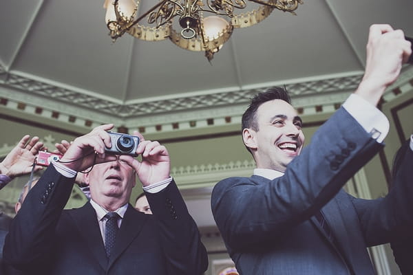 Wedding guests taking pictures