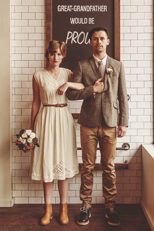 Vintage bride and groom with arms linked