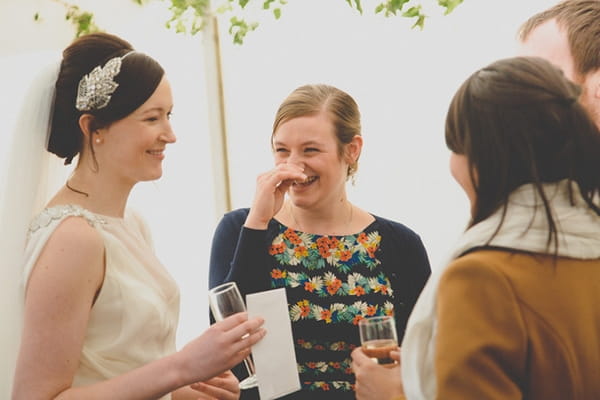 Bride talking to guests