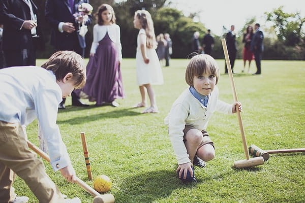 Children playing croquet