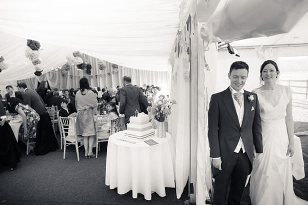 Bride and groom about to enter wedding breakfast