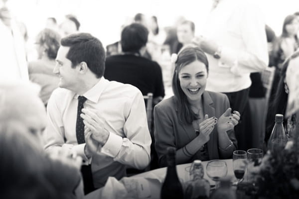 Wedding guests clapping