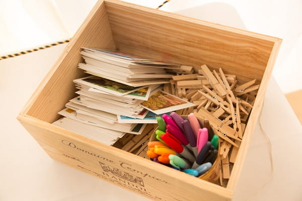 Box of cards and pegs