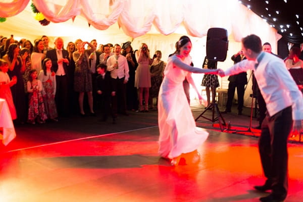 Bride and groom dance