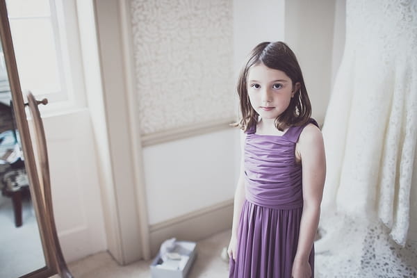 Flower girl in purple dress