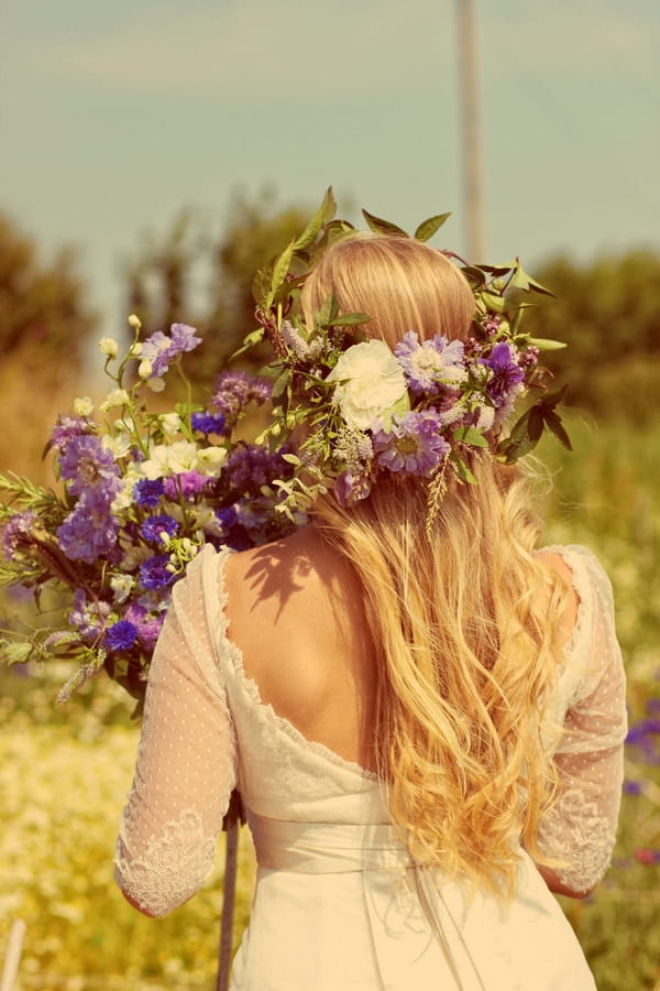 Back of vintage bride with floral headpiece