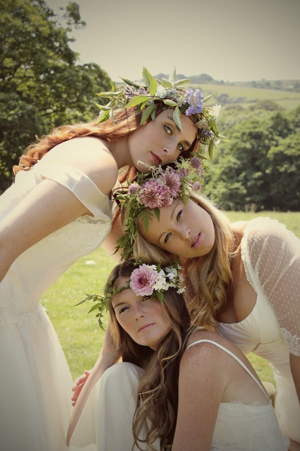 Three vintage brides with floral headpieces