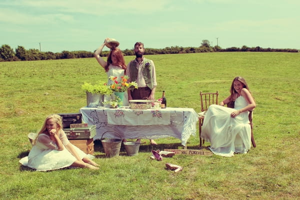 Vintage brides and groom in floral shoot