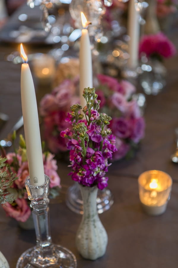 Candles and wedding table flowers