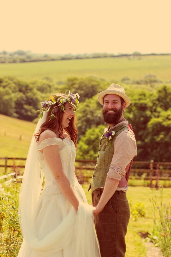 Vintage bride and groom facing each other