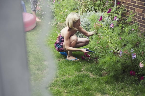 Woman picking flowers