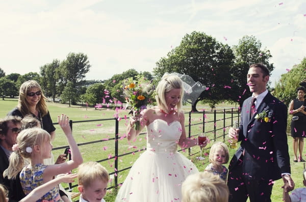 Bride and groom confetti shot