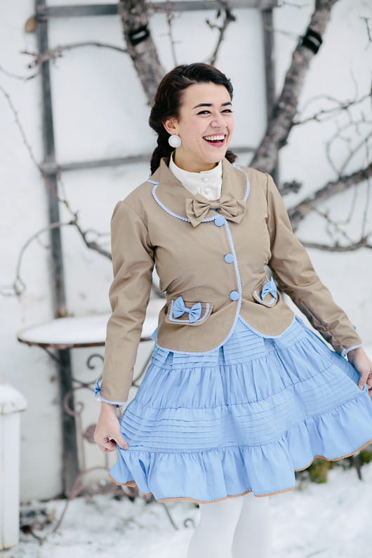 Bridesmaid with blue skirt in snow