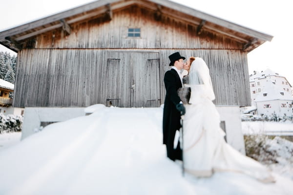 Bride and groom in snow