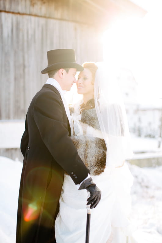 Bride and groom in snow