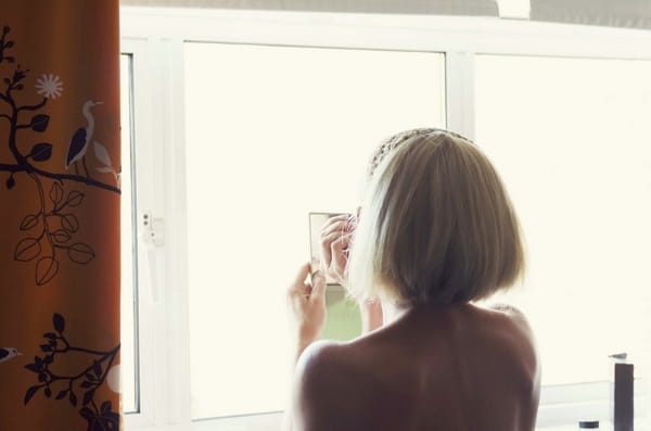 Bride doing make-up