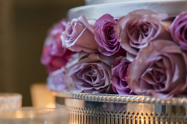 Purple flowers in wedding cake