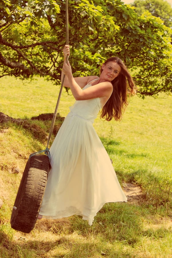 Vintage brdie on rope swing