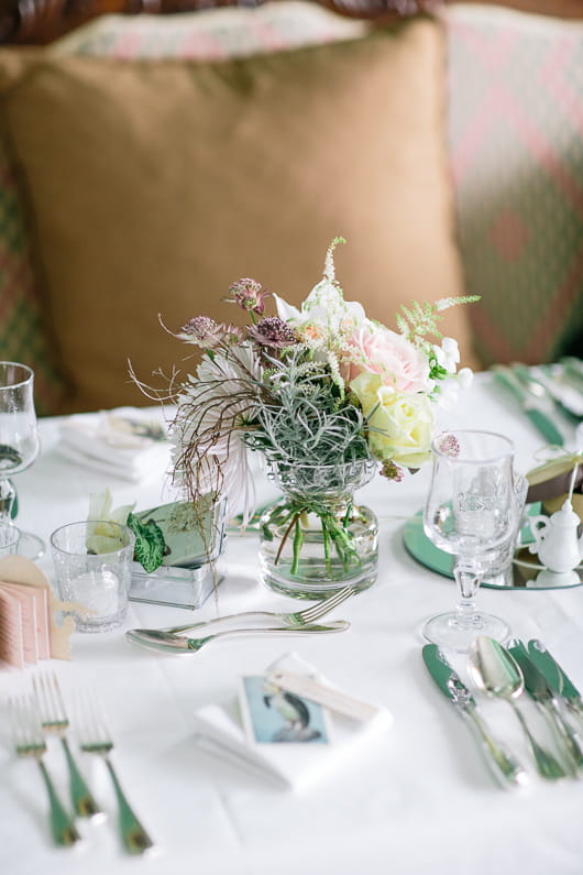 Small vase of flowers on wedding table